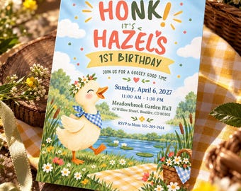 May include: A rectangular birthday invitation card featuring a cartoon duckling wearing a flower crown and blue gingham scarf. The text reads: HONK! IT'S HAZEL'S 1ST BIRTHDAY, Sunday, April 6, 2027, 11:00 AM - 1:30 PM, Meadowbrook Garden Hall, 42 Willow Street, Boulder, CO 80302, RSVP to Mom: 555-209-7614.