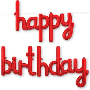 May include: A set of shiny red foil balloons forming the words happy birthday in a cursive script font. The letters are connected by a thin string, creating a banner arrangement. The balloons have a metallic finish and a distinct inflated appearance.