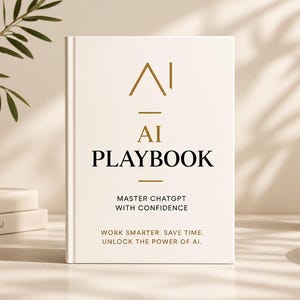 Può includere: Un libro con copertina rigida bianca intitolato AI PLAYBOOK con testo in oro e nero. La copertina riporta MASTER CHATGPT WITH CONFIDENCE e WORK SMARTER. SAVE TIME. UNLOCK THE POWER OF AI. Il libro è posizionato verticalmente con un logo dorato.