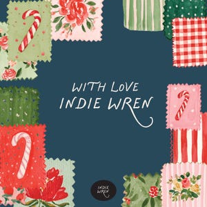 May include: A dark blue square background featuring the text WITH LOVE INDIE WREN in white. The border is composed of various fabric swatches with patterns including red and white candy canes, pink roses, red gingham, and green stripes.