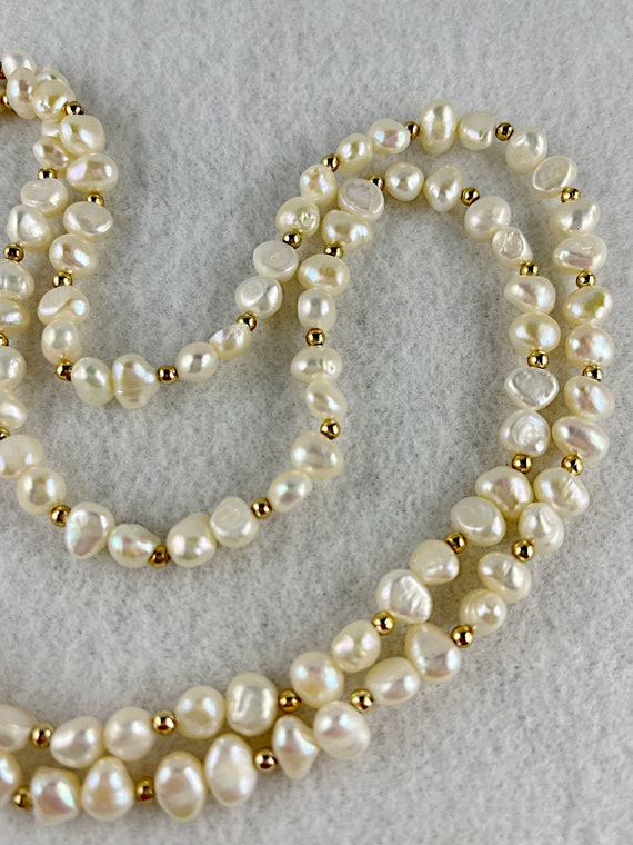 Single Strand of Freshwater Pearls With Gold Tone Bead Accents