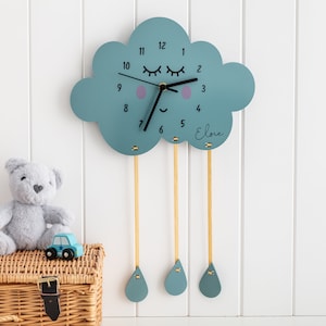 Cloud And Raindrops Children's Personalised Wall Clock