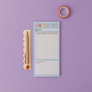May include: A blue to-do list notepad with the words "My To Do List" in rainbow colours. The notepad has a section for "Things I Need To Get Done" with a checklist and a section for "Procrastination Notes".