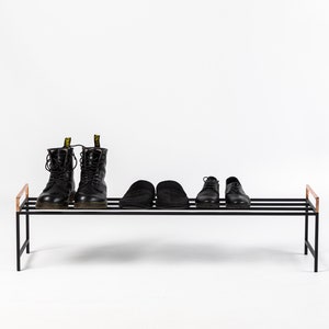 Black metal shoe rack with copper handles. Hand Welded in Ukraine. Hand welded from high grade steel square tube. Design Atelier Article on Etsy