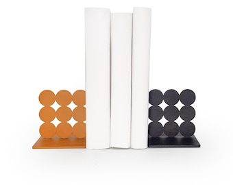 Moderne geometrische Bauhaus-boekensteunen – sculpturale metalen boekhouders