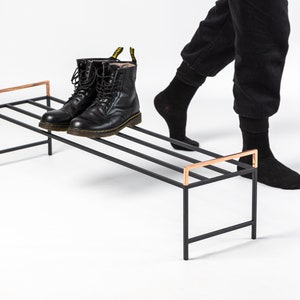 Black metal shoe rack with copper handles. Hand Welded in Ukraine. Hand welded from high grade steel square tube. Design Atelier Article on Etsy