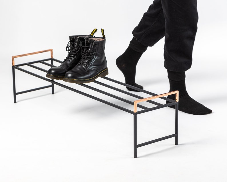 Black metal shoe rack with copper handles. Hand Welded in Ukraine. Hand welded from high grade steel square tube. Design Atelier Article on Etsy