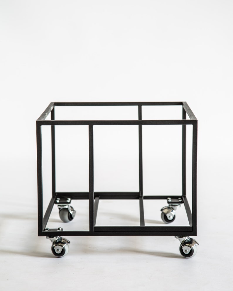 Empty black metal vinyl record cart frame with a minimalist square design, shown on four smooth-rolling caster wheels against a white background.