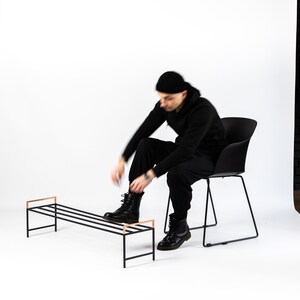 Black metal shoe rack with copper handles. Hand Welded in Ukraine. Hand welded from high grade steel square tube. Design Atelier Article on Etsy