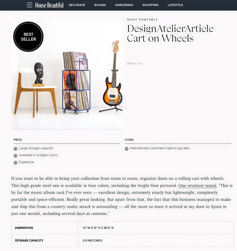 May include: A blue metal record storage cart with wheels. The cart is filled with vinyl records and is next to a bass guitar. The cart is 13 inches wide, 13 inches deep, and 36.5 inches high. It can hold up to 210 records.