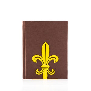A metal bookend French Lily Yellow