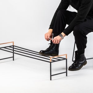 Black metal shoe rack with copper handles. Hand Welded in Ukraine. Hand welded from high grade steel square tube. Design Atelier Article on Etsy