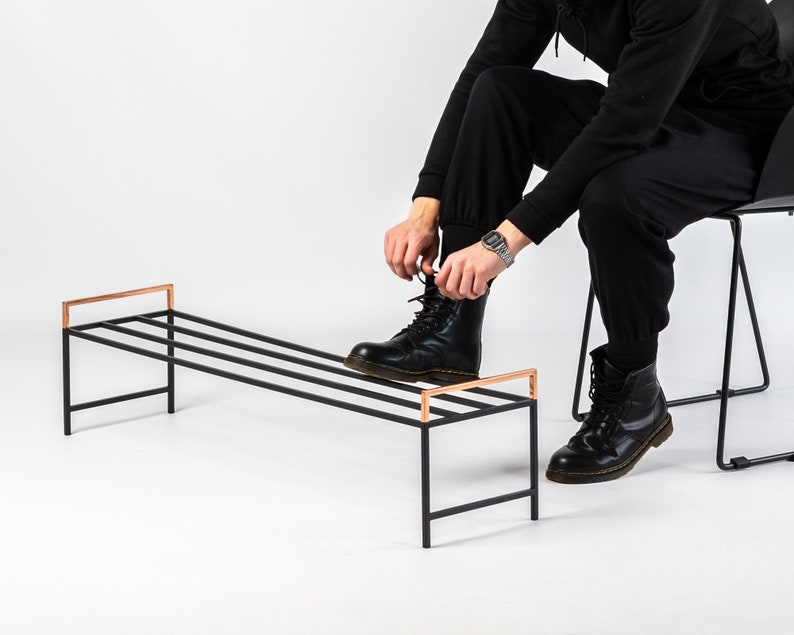 Black metal shoe rack with copper handles. Hand Welded in Ukraine. Hand welded from high grade steel square tube. Design Atelier Article on Etsy