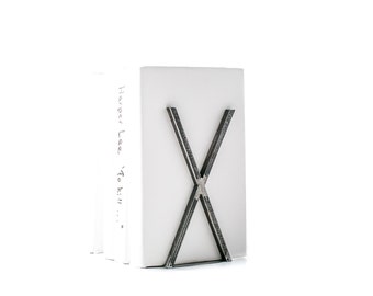 Decoratieve boekensteun - Raw X-factor - minimalistische stijl