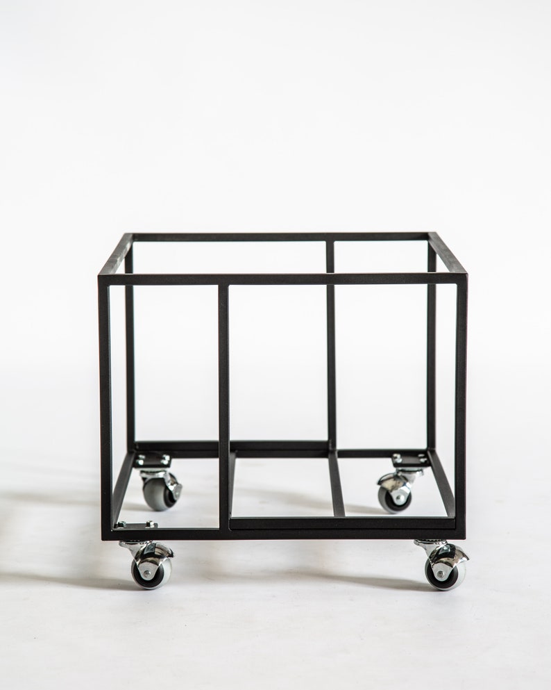 Empty black metal vinyl record cart frame with a minimalist square design, shown on four smooth-rolling caster wheels against a white background.