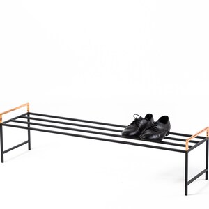 Black metal shoe rack with copper handles. Hand Welded in Ukraine. Hand welded from high grade steel square tube. Design Atelier Article on Etsy