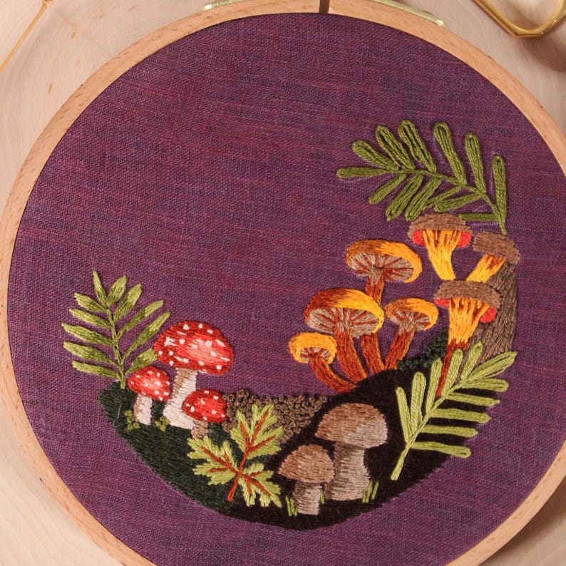 close up of a colorful mushroom embroidery pattern