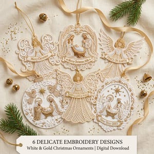 May include: Six white and gold embroidered Christmas ornaments featuring intricate lace-like patterns. Designs include angels and nativity scenes with text reading Merry Christmas, Merry Christmas 2026, Peace on Earth, Hope & Love & Peace, and New Year 2027.