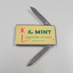 RARE The Mint Downtown Casino Las Vegas Advertising Money Clip and Pen Knife and File