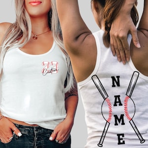 two women wearing white tank tops with baseball-themed designs.