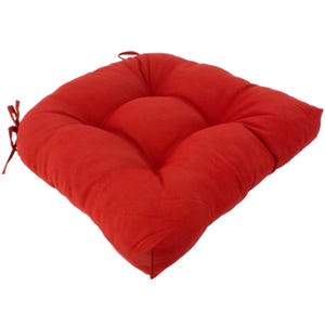 May include: A square red seat cushion featuring a tufted design with four circular indentations across the surface. The cushion includes fabric ties at the corners for securing it to a chair, and it has a visible seam along the outer edge.