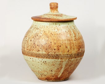 Lidded stoneware storage jar for coffee beans, cookies, grains, glazed in matte yellow/brown glaze