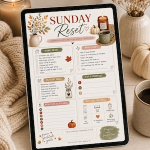 May include: A digital tablet displaying a Sunday Reset planner template with autumn-themed illustrations. The layout includes sections for Home Reset, Mind Reset, Plan My Week, Top 3 Priorities, Meal Plan, and Self-Care, featuring text and icons.