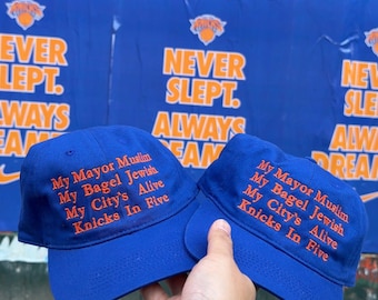Gorra de los New York Knicks: Gorra bordada con la frase "Mi alcalde es musulmán, mi bagel es judío".