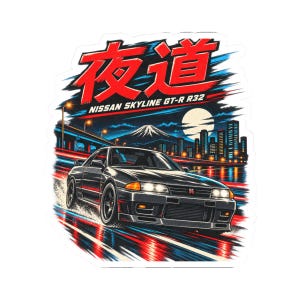 May include: A sticker featuring a dark grey Nissan Skyline GT-R R32 driving on a wet road at night. The background shows a city skyline, a full moon, and Mount Fuji. The Japanese text reads 夜道 and the English text reads NISSAN SKYLINE GT-R R32.