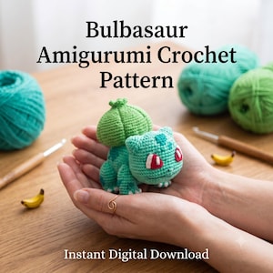 May include: A Bulbasaur amigurumi crochet pattern featuring the text Bulbasaur Amigurumi Crochet Pattern and Instant Digital Download. The image shows a small, crocheted green creature with a bulb on its back, red eyes, and yarn balls.