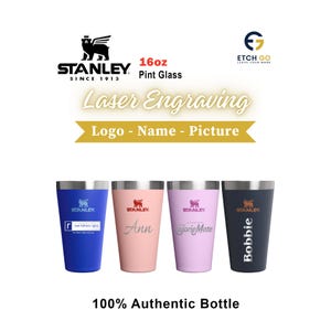May include: Four 16oz Stanley pint glasses in blue, pink, light purple, and dark gray. Each features the Stanley logo and custom laser engraving including the text 'real fathers rights', 'Ann', 'CalorieMate', and 'Bobbie'. The image includes text 'Laser Engraving', 'Logo - Name - Picture', and '100% Authentic Bottle'.