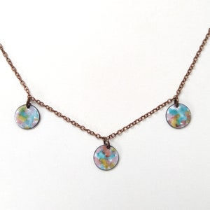 Short chain with three colorful enamel pendants