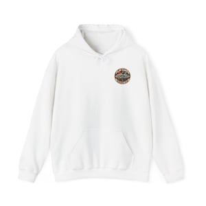 May include: A white hooded sweatshirt featuring a circular graphic on the left chest. The graphic depicts a flat earth landscape with a sun, moon, and stars, surrounded by the text "FLAT EARTH RESEARCH TEAM" in a dark brown circular border.