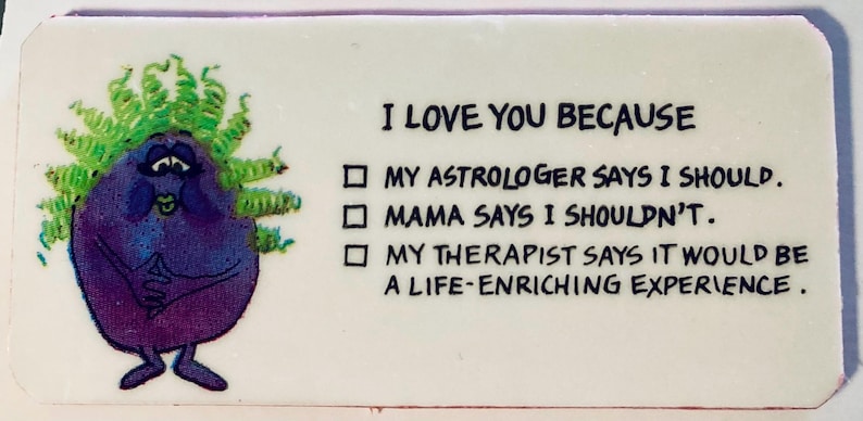 May include: A rectangular white sticker with the text "I LOVE YOU BECAUSE" and three bullet points. A cartoon character with purple skin and green hair is on the left side.