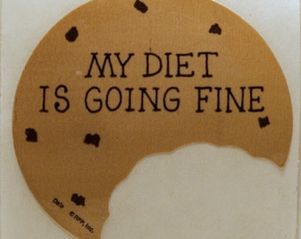 My Diet is Going Fine sticker showing a cookie with a bite out of it, 1980's