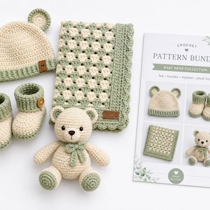 May include: A crochet pattern bundle for a baby bear collection including a cream and sage green bear-eared hat, matching booties with wooden buttons, a textured blanket, and a stuffed bear toy, accompanied by an instructional paper guide.