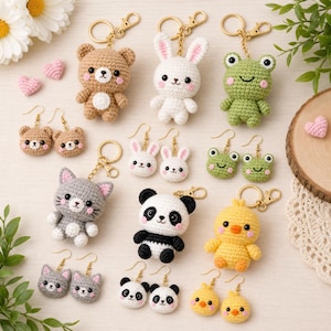May include: A collection of crocheted animal keychains and matching earrings featuring a brown bear, white rabbit, green frog, gray cat, panda, and yellow chick. Each item has embroidered facial features and pink cheeks, with gold-tone hardware.
