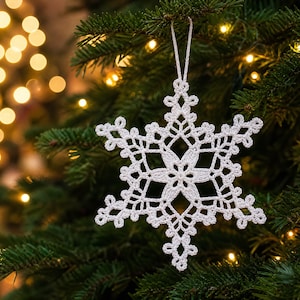 May include: A white crocheted snowflake ornament with intricate lace-like patterns and a central star design. The six-pointed star shape features delicate loops and openwork, suspended by a thin white thread loop for hanging on a tree branch.