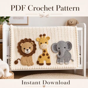 May include: A PDF crochet pattern for a cream-coloured baby blanket featuring three appliqued animals: a brown lion with a dark mane, a yellow giraffe with brown spots, and a grey elephant. The text reads PDF Crochet Pattern and Instant Download.