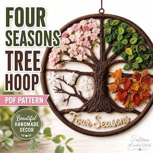 May include: A circular crochet wall hanging featuring a tree divided into four sections representing the seasons: pink blossoms for spring, green leaves for summer, orange and red leaves for autumn, and white snowflakes for winter. The text reads Four Seasons.