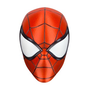 Puede incluir: Una máscara de rostro completo con una superficie roja texturizada y un patrón de telaraña negro prominente en todo el frente. La máscara incluye dos lentes oculares blancos grandes en forma de almendra, delineados con bordes negros gruesos.