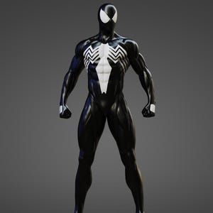 May include: A black and white figurine of a character in a sleek suit with a large white spider emblem on the chest and white eye patches. The figure stands on a rectangular base featuring a red brick section and grey stone top and bottom edges.
