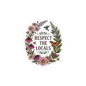 May include: A die-cut sticker featuring a floral wreath of pink, purple, and green wildflowers surrounding the text "RESPECT THE LOCALS" in dark brown letters. The design includes a hummingbird, a monarch butterfly, and two small bees.