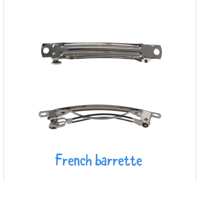 May include: Two silver French barrettes, one open and one closed. The barrettes are designed to hold hair in place.