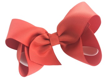 Burnt Orange hair bow - 4 inch hair clip or Baby Headband