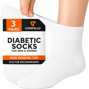 May include: A set of three pairs of white ankle socks with a non-binding top. The packaging features the text 3 PAIRS, COMFELLO, DIABETIC SOCKS FOR MEN & WOMEN, NON-BINDING TOP, and DOCTOR RECOMMENDED in black and orange on a white background.