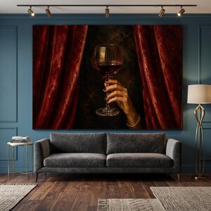 Toile représentant une main élégante tenant un verre de vin rouge, décoration murale sophistiquée pour bar, ambiance sombre et feutrée, impression sur toile représentant une boisson de luxe