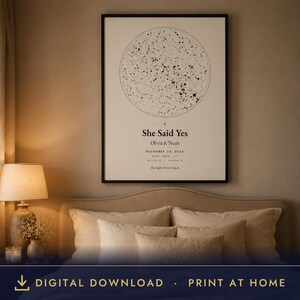 May include: A vertical rectangular wall art print featuring a circular black and white star map. Below the map, the text reads: She Said Yes, Olivia & Noah, December 24, 2024, New York, NY, and The night forever began. The print is in a black frame.