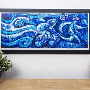May include: A framed abstract art print in shades of blue and white. The print features swirling lines and geometric shapes, creating a dynamic and energetic composition.