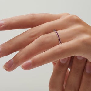 Ruby full eternity ring, continuous shared-claw pavé, 18ct gold, Hatton Garden Vogue — gallery view 9